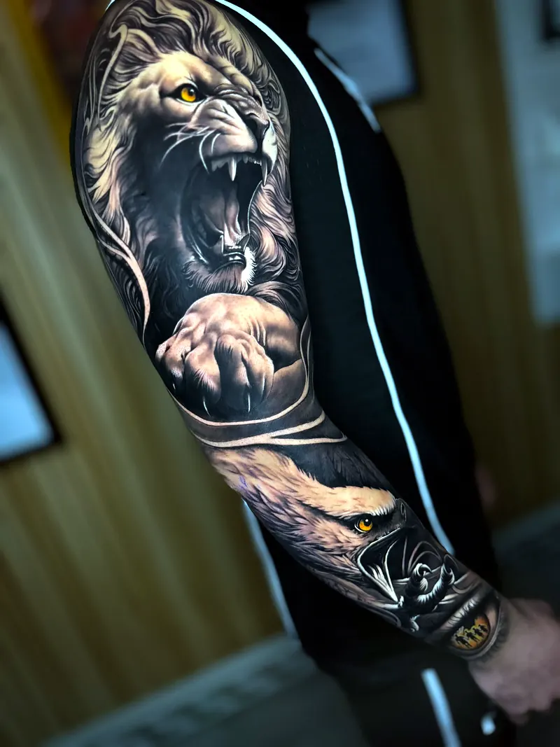 Realistic lion sleeve tattoo by Deyvid